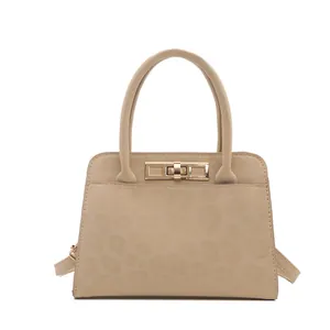 Sac à main chic beige à motif léopard avec fermoir rotatif doré et doubles poignées