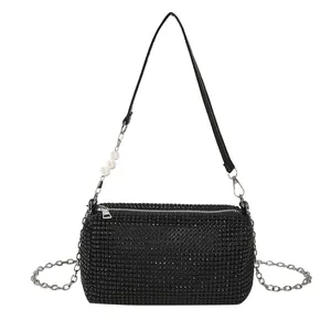 Black rhinestone hobo bag with sparkling crystals, pearl strap and chain