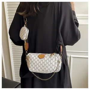 Detailed 3-in-1 crossbody bag set with white and taupe monogram print and wide strap