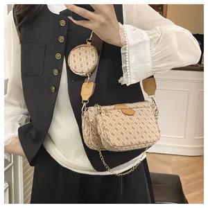 Three-in-one crossbody bag with beige monogram pattern and wide fabric shoulder strap