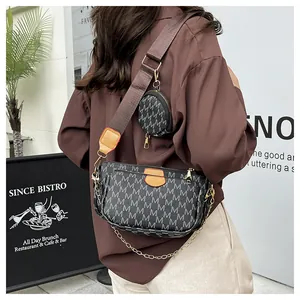 Three-in-one crossbody bag featuring M-letter monogram print and wide nylon strap