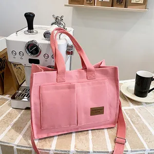 Sac fourre-tout en toile rose avec bandoulière réglable et deux poignées en café