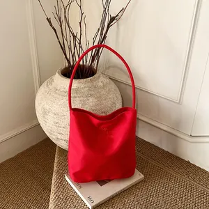 Minimalist bright red bucket tote bag with Hope and Future embossed text design