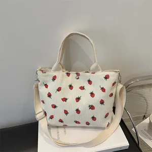 Corduroy tote bag with strawberry print and adjustable shoulder strap for women