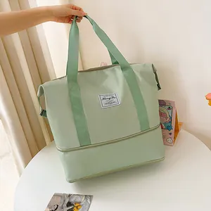 Detail view of the large capacity travel bag with waterproof fabric and separate compartment
