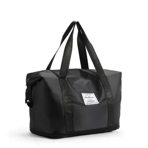 Macro shot of waterproof black travel bag with dry-wet separation and bottom shoe compartment