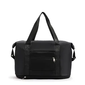 Detail of multi-functional travel bag with separate bottom shoe compartment and front pocket