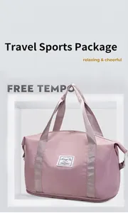 Pink travel bag detail featuring waterproof fabric and front brand logo on white podium