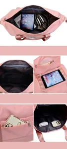 Detalle del bolso de viaje de nailon rosa con bolsillo de separación seco-húmedo y espacio