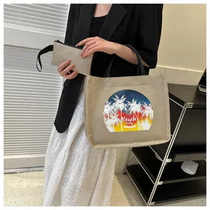 Close-up of linen tote bag set with Beach Party print and matching small zipper pouch