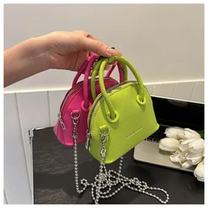 Mini shell bags in litchi pattern leather with detachable silver metal chain straps