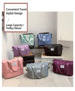 Waterproof large capacity travel bags in multiple colors with trolley sleeve for luggage