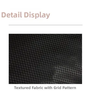 Detail view of the black textured fabric with a premium checkered diamond grid pattern