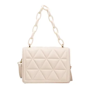 Minimalist cream white shoulder bag with triangle quilting and acrylic chain strap
