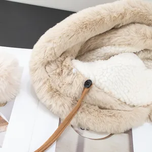 Thick plush winter bucket hat with faux fox fur lining and warm fleece material