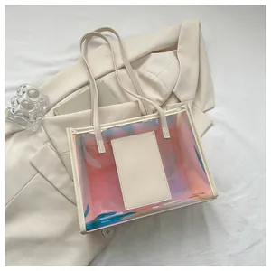 Close-up of PVC laser tote bag with iridescent finish and cream white handle detail