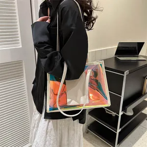 Holographic PVC tote bag with white leather straps shown on model for a trendy look