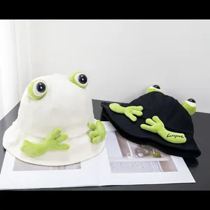 Simpatici cappelli a secchiello rana in crema e nero con braccia 3D e ricami