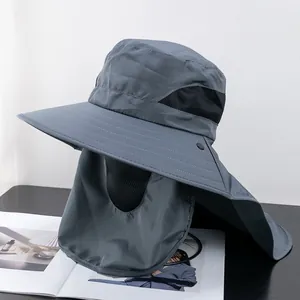 Detail view of dark grey sun hat with face cover and neck flap for outdoor protection