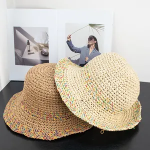 Detailed weave of summer crochet straw hats in khaki and colorful striped patterns