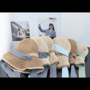 Japanese straw sun hat for women with colorful checkered ribbons and woven texture