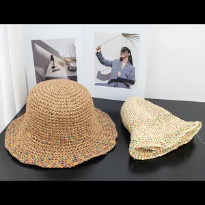 Women's crochet straw sun hat with rainbow woven wide brim for summer beach vacations