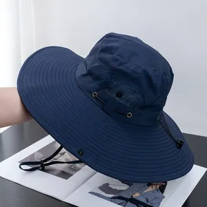 Detail of dark blue sun hat featuring breathable mesh vents and adjustable wind rope