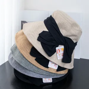 Women's UV protection sun hat with large bow in beige, khaki, grey and black colors