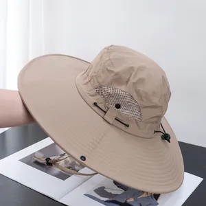 Detail of khaki sun hat with breathable side mesh and adjustable black chin strap cord