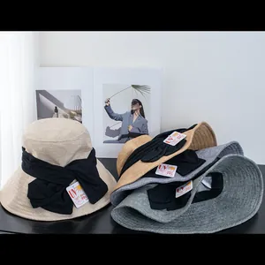 UV protection sun hat for women with large bow, foldable wide brim fisherman style
