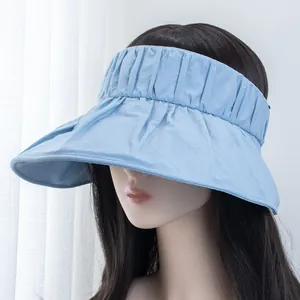Detail view of the light blue sun visor with pleated fabric and a wide protective brim