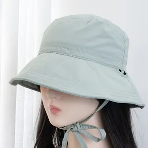 Breathable mint green sun hat with drawstring and decorative white stitching detail