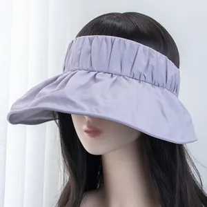 Macro detail of lavender pleated brim UV sun hat showing fabric texture and ruffle design