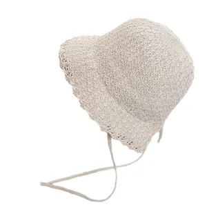 Chic beige knitted sun hat with scalloped lace edge and chin straps for women and children