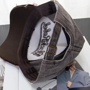 Distressed dark gray denim baseball cap with BlackRebel embroidery and metal buckle