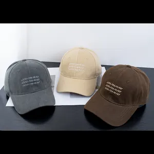 Three vintage cotton baseball caps in brown, khaki, and grey with 3D letter embroidery