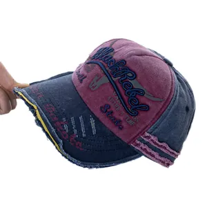 Distressed vintage navy and burgundy baseball cap with BlackRebel embroidery and frayed edge