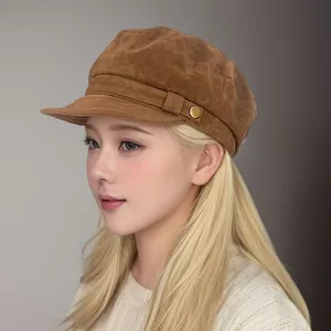Retro brown suede newsboy cap for women with vintage metal button and navy style detail