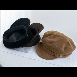 Retro corduroy newsboy hats in black brown and khaki with decorative gold metal buttons