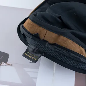 Close-up of sailor hat inner lining featuring premium suede trim and care label