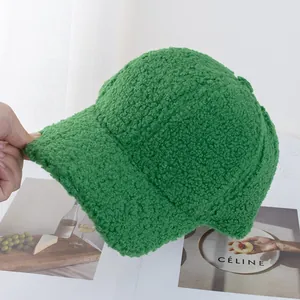 Detail shot of the soft green fuzzy fleece texture on this minimalist baseball cap