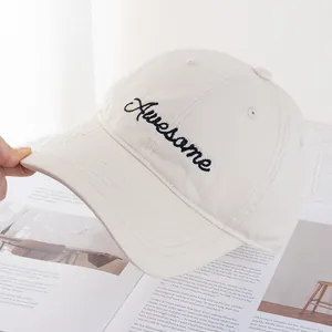 Detailed embroidery of Awesome lettering on a premium beige cotton baseball cap