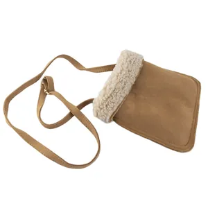 Brown suede crossbody bag with fluffy faux fur trim and adjustable gold buckle strap