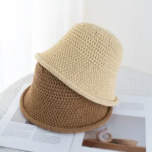 Breathable woven bucket hats in beige and brown, featuring a round top and rolled brim