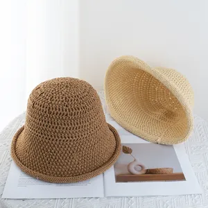 Elegant knit bucket hat with breathable hollow pattern and rolled brim for women