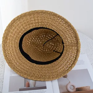 Handwoven straw Panama hat for women with black sweatband for beach and summer vacations
