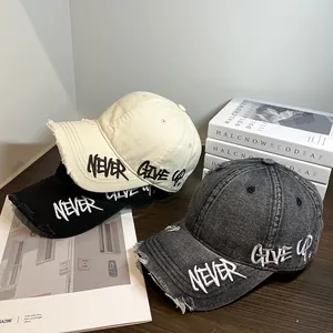 Vintage washed distressed baseball caps with Never Give Up embroidery in three colors