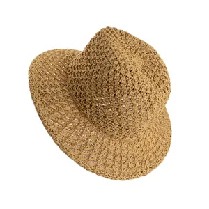 Handmade hollow-out Panama straw hat for women featuring sun protection and jazz style