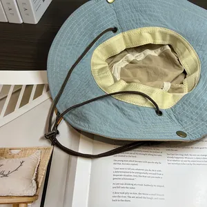 Sky blue quick-dry sun hat with wide brim and adjustable wind cord for outdoor hiking