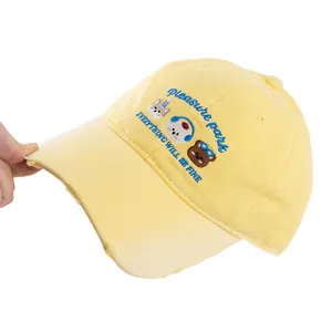 Yellow cotton baseball cap with cute animal embroidery and distressed brim details